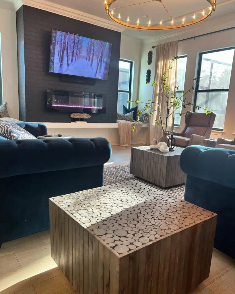 Cozy living room with modern decor and fireplace.